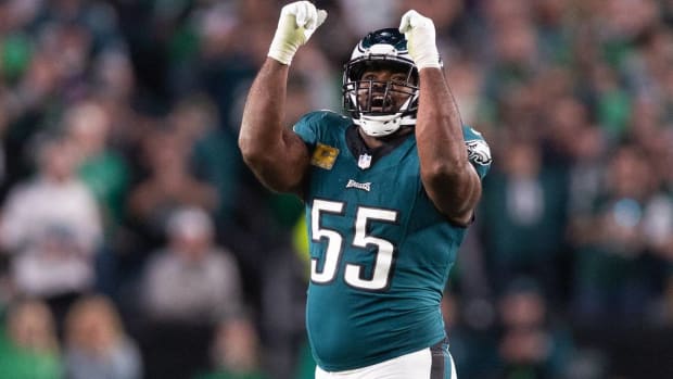 Eagles pass rusher Brandon Graham celebrates after making a play in a game.
